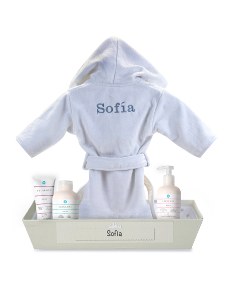 Natural cosmetic products for babies with embroidered bathrobe